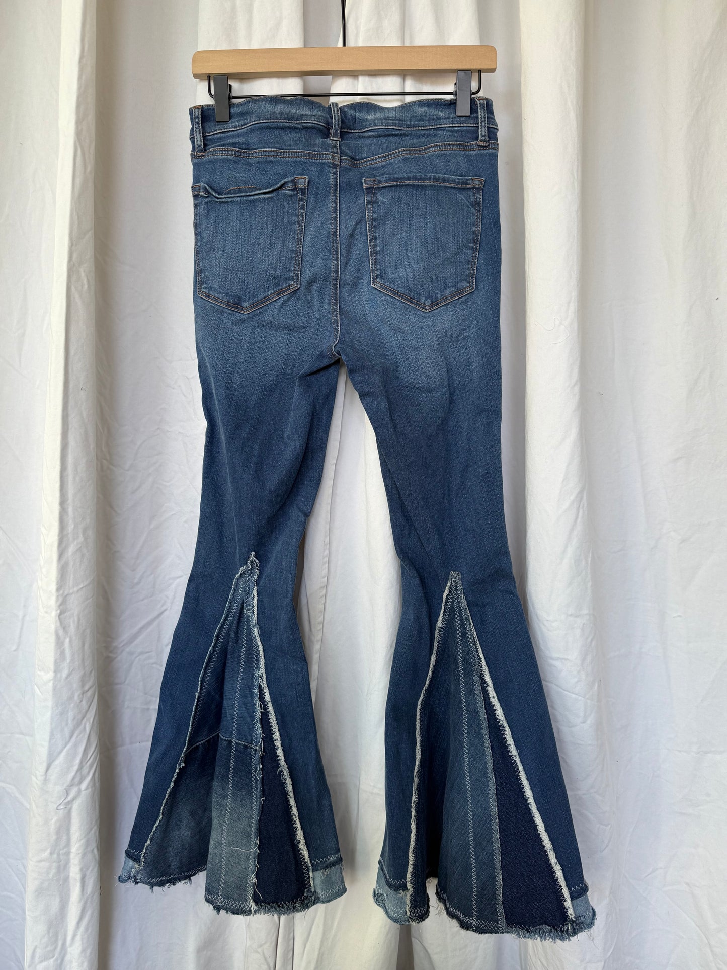 Chiefs Bell Bottom Jeans (size 6) – Red Flower Appliqué
