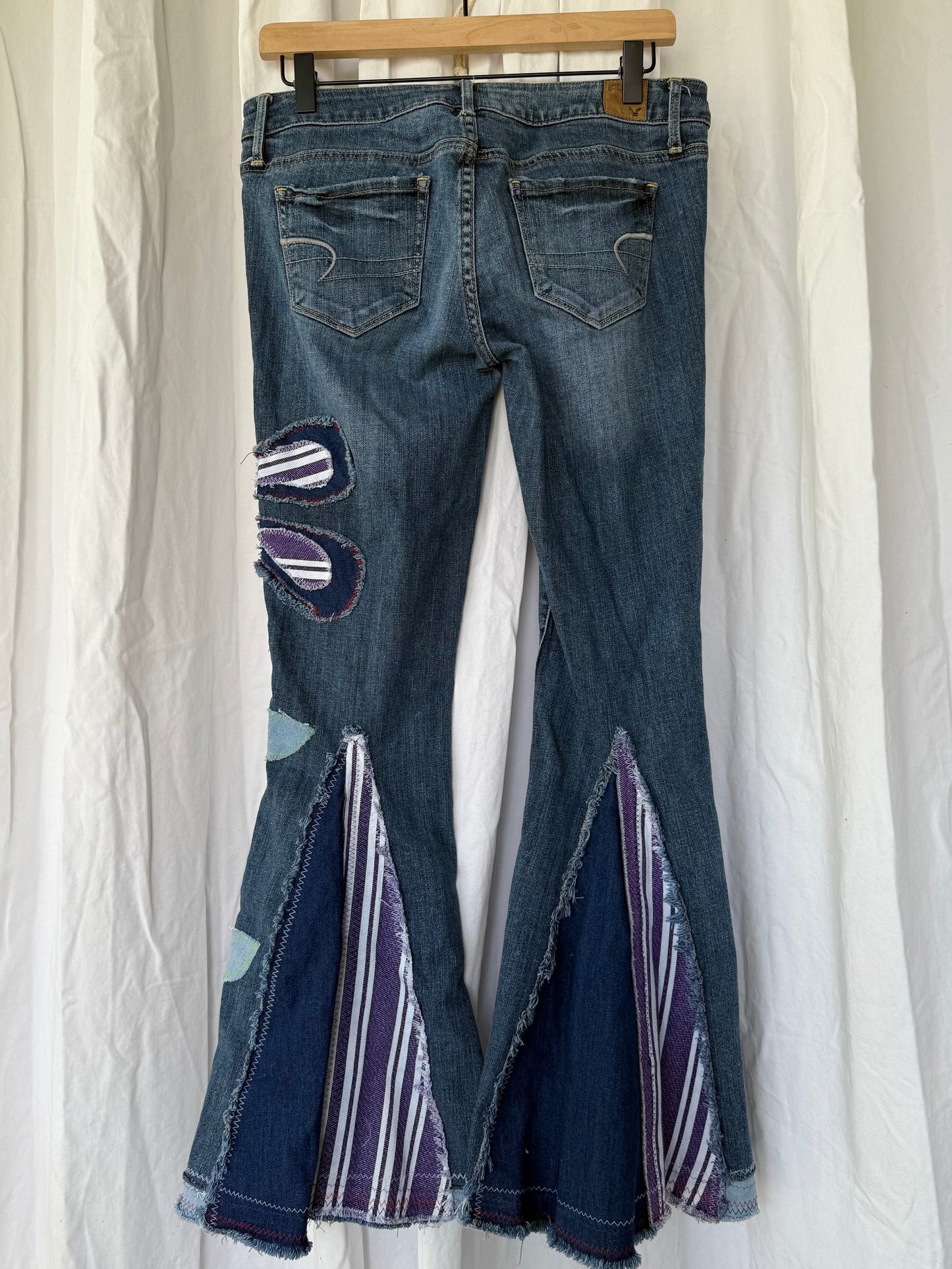 Striped Bell Bottom Jeans (size 6)– Retro Floral Appliqué