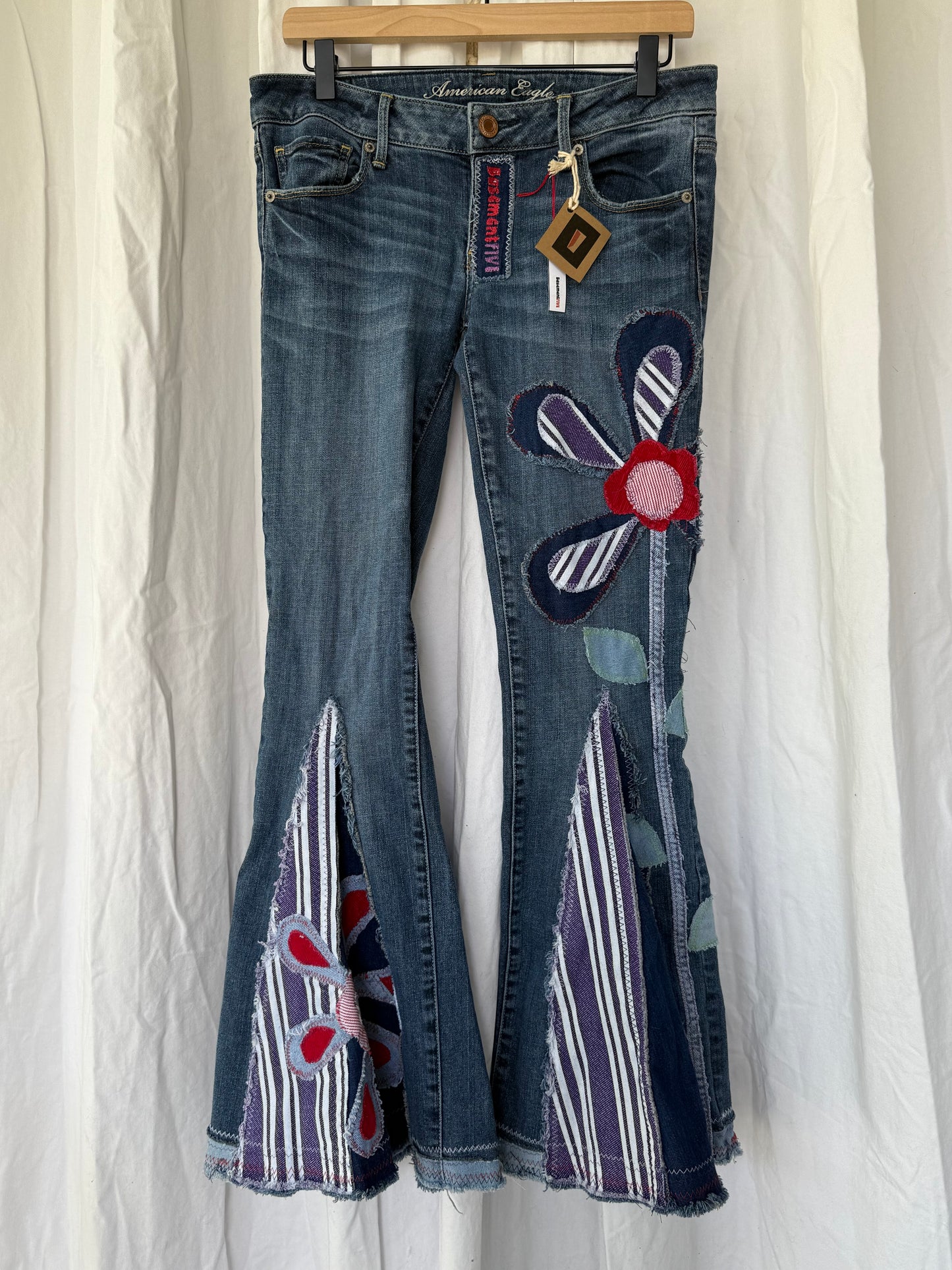 Striped Bell Bottom Jeans (size 6)– Retro Floral Appliqué