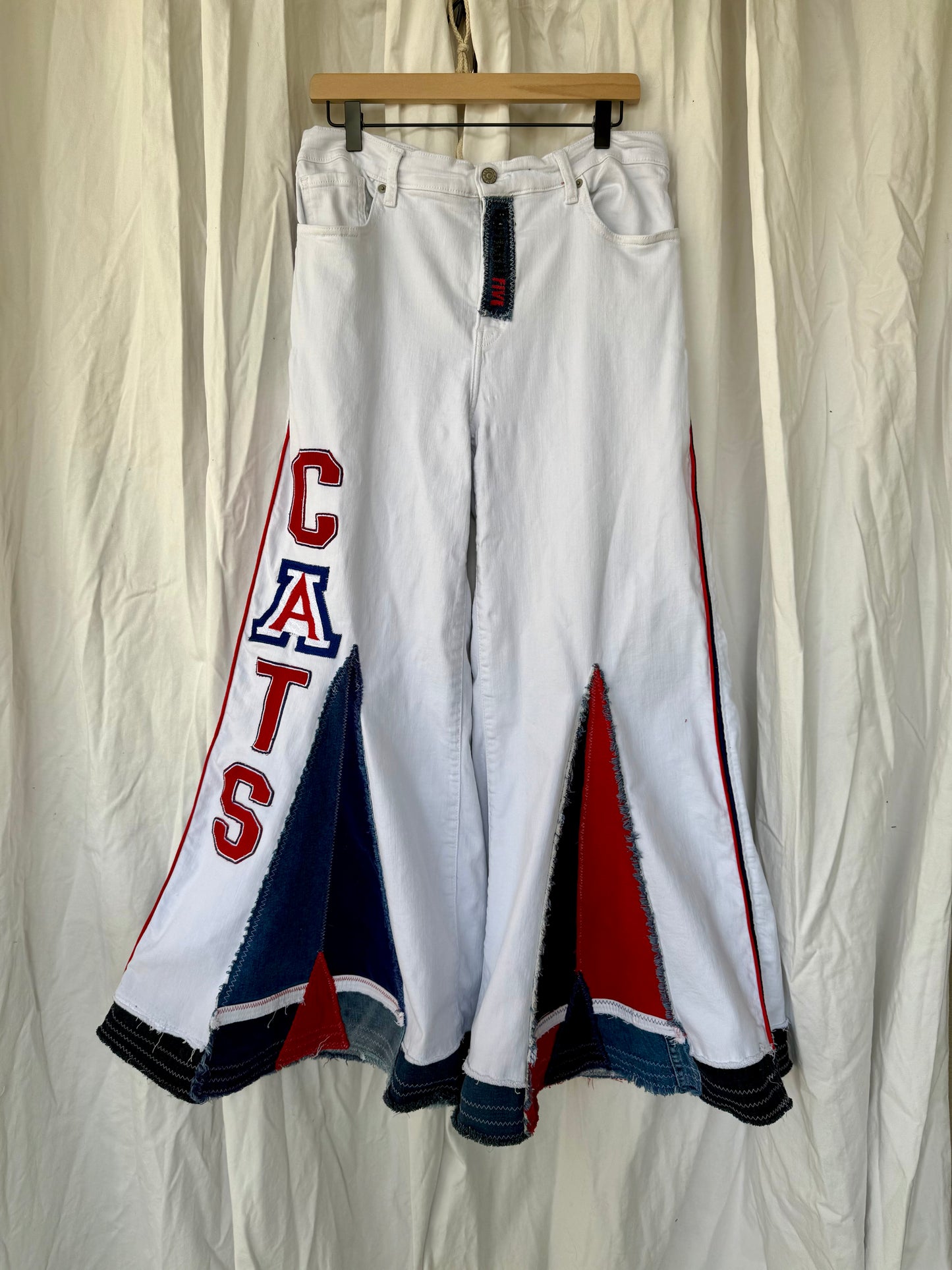 Upcycled “Wildcat Pride” Bell Bottom Jeans (size 16)