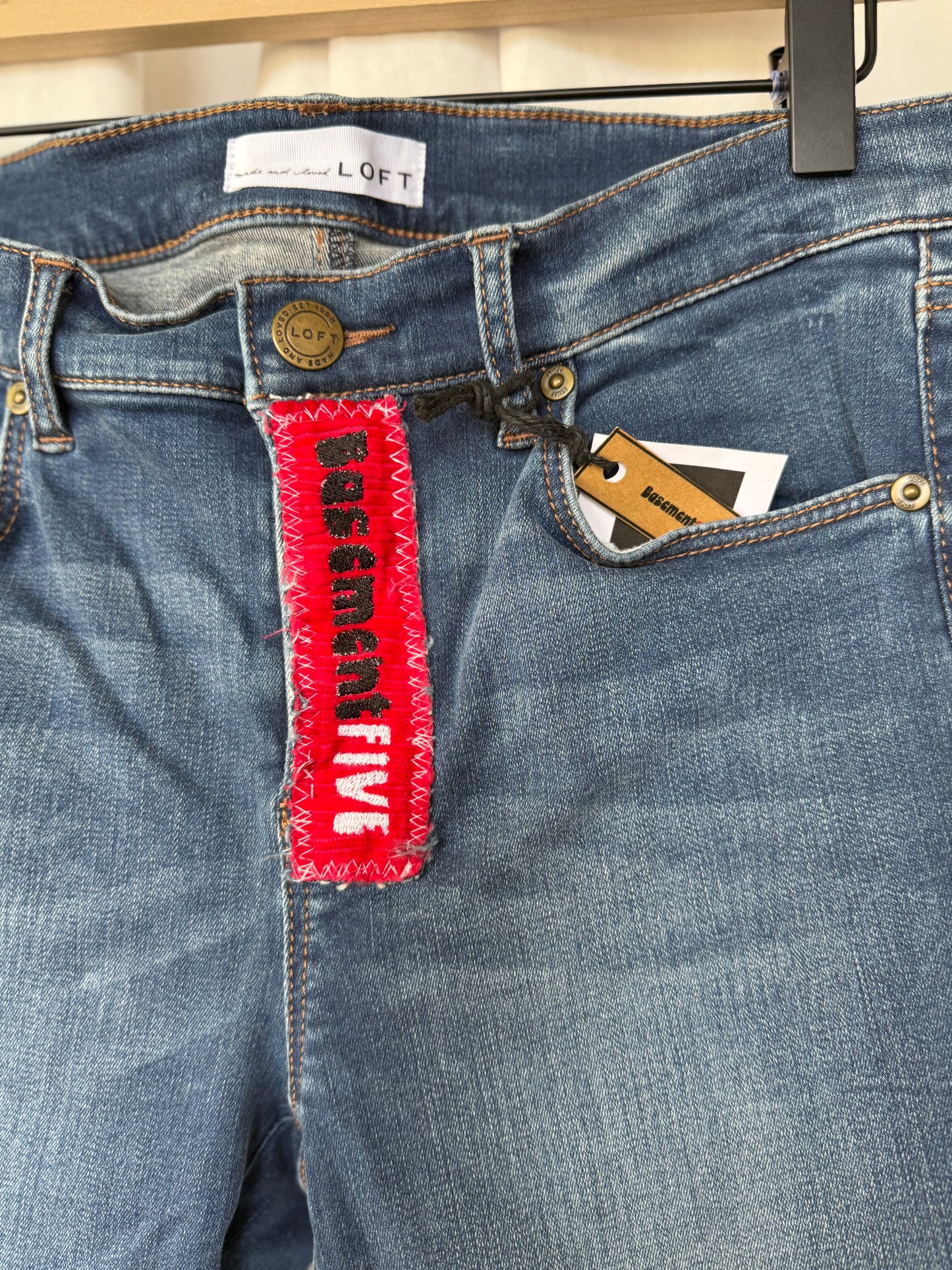 Chiefs Bell Bottom Jeans (size 6) – Red Flower Appliqué