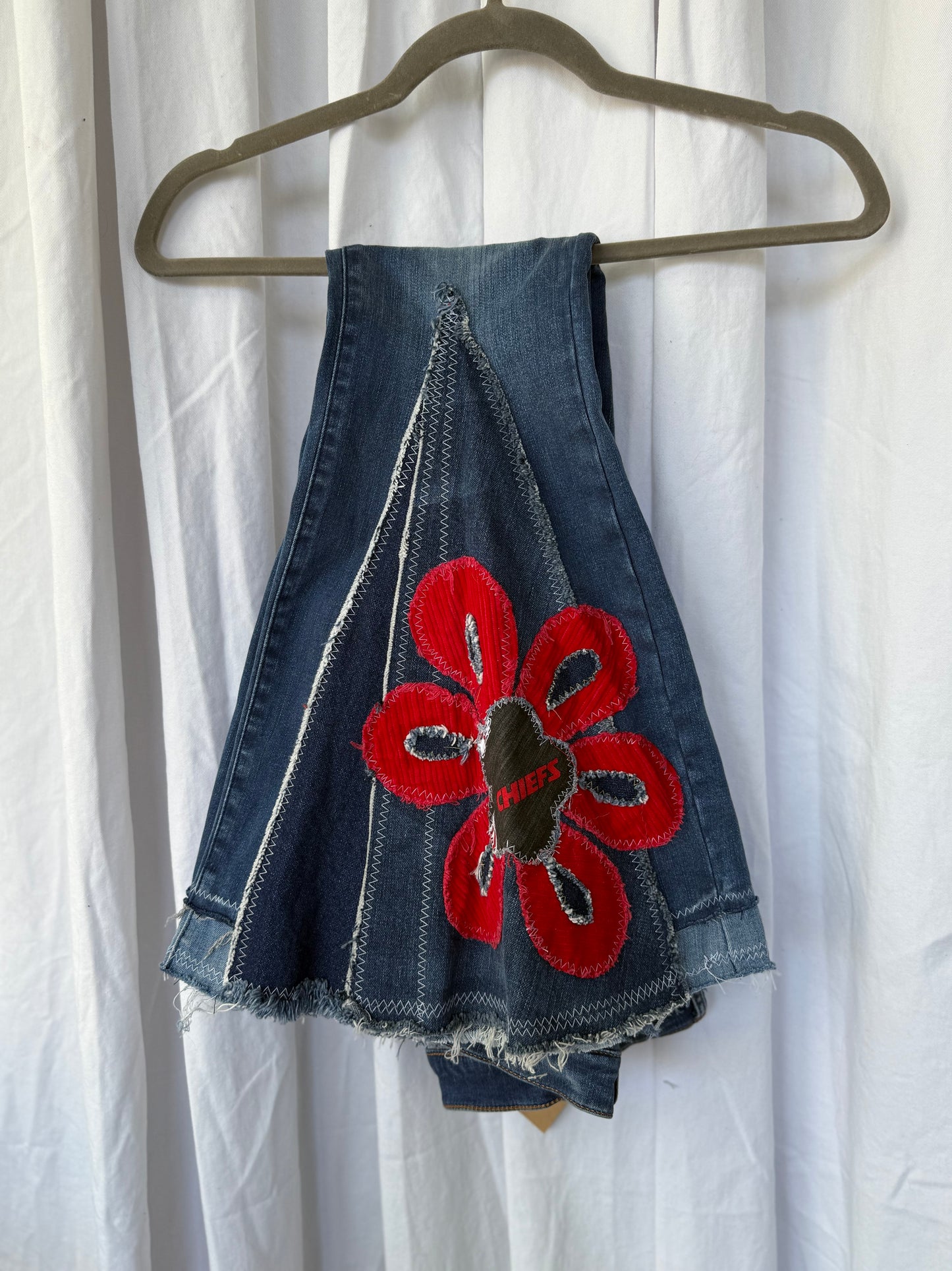 Chiefs Bell Bottom Jeans (size 6) – Red Flower Appliqué