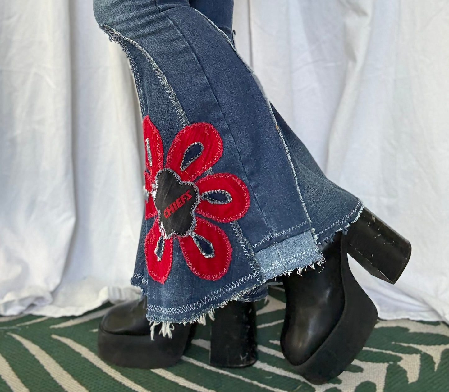 Chiefs Bell Bottom Jeans (size 6) – Red Flower Appliqué