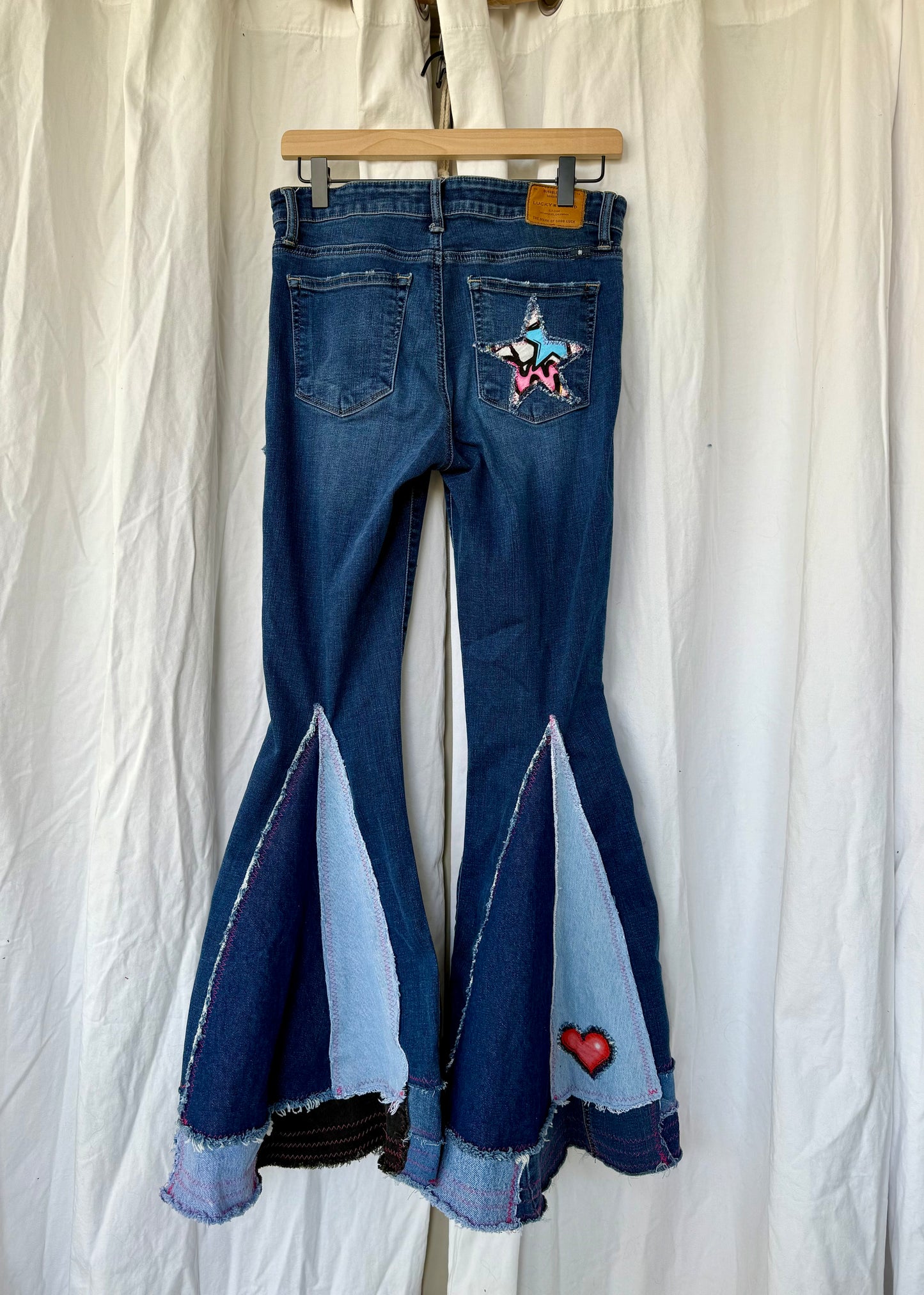 Sugar Skull Star Bell Bottom Jeans (size 8)