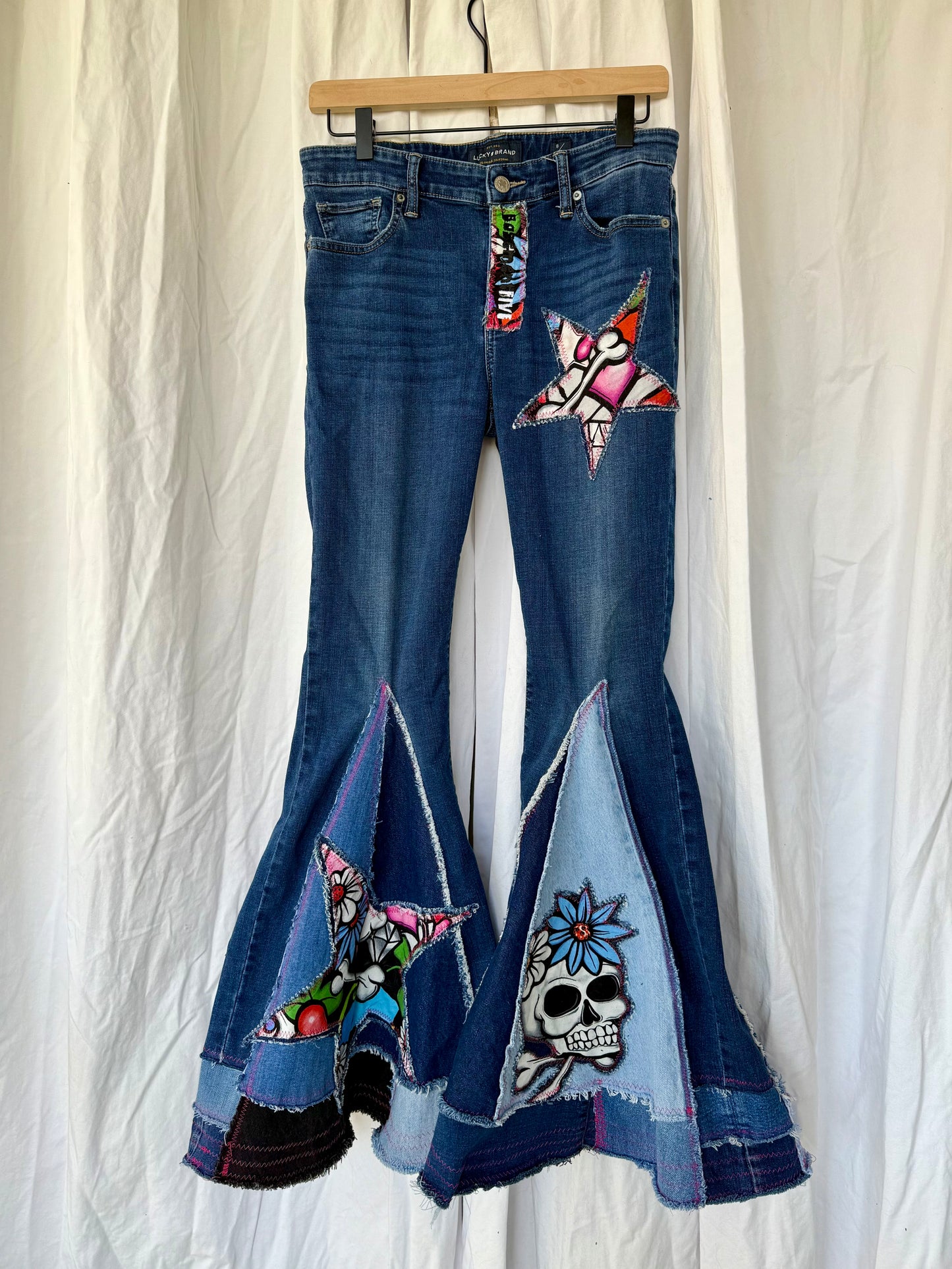 Sugar Skull Star Bell Bottom Jeans (size 8)