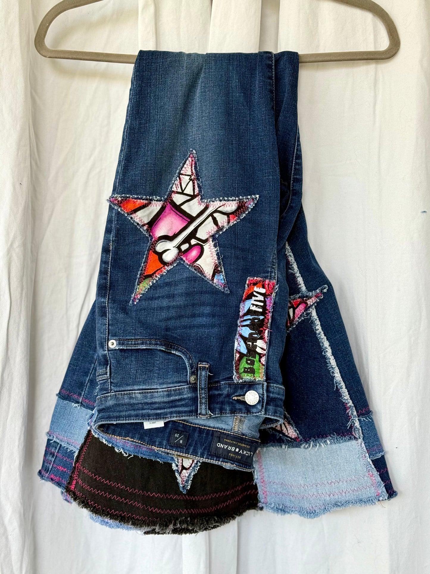 Sugar Skull Star Bell Bottom Jeans (size 8)