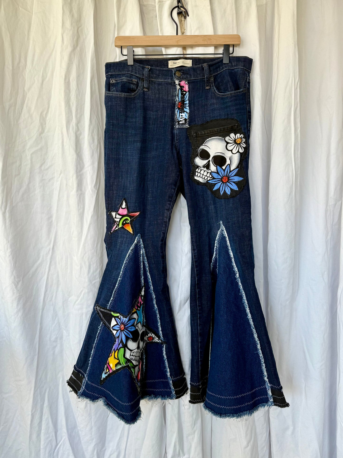 Sugar Skull Star Bell Bottoms – Upcycled Denim Statement Jeans (size 12)