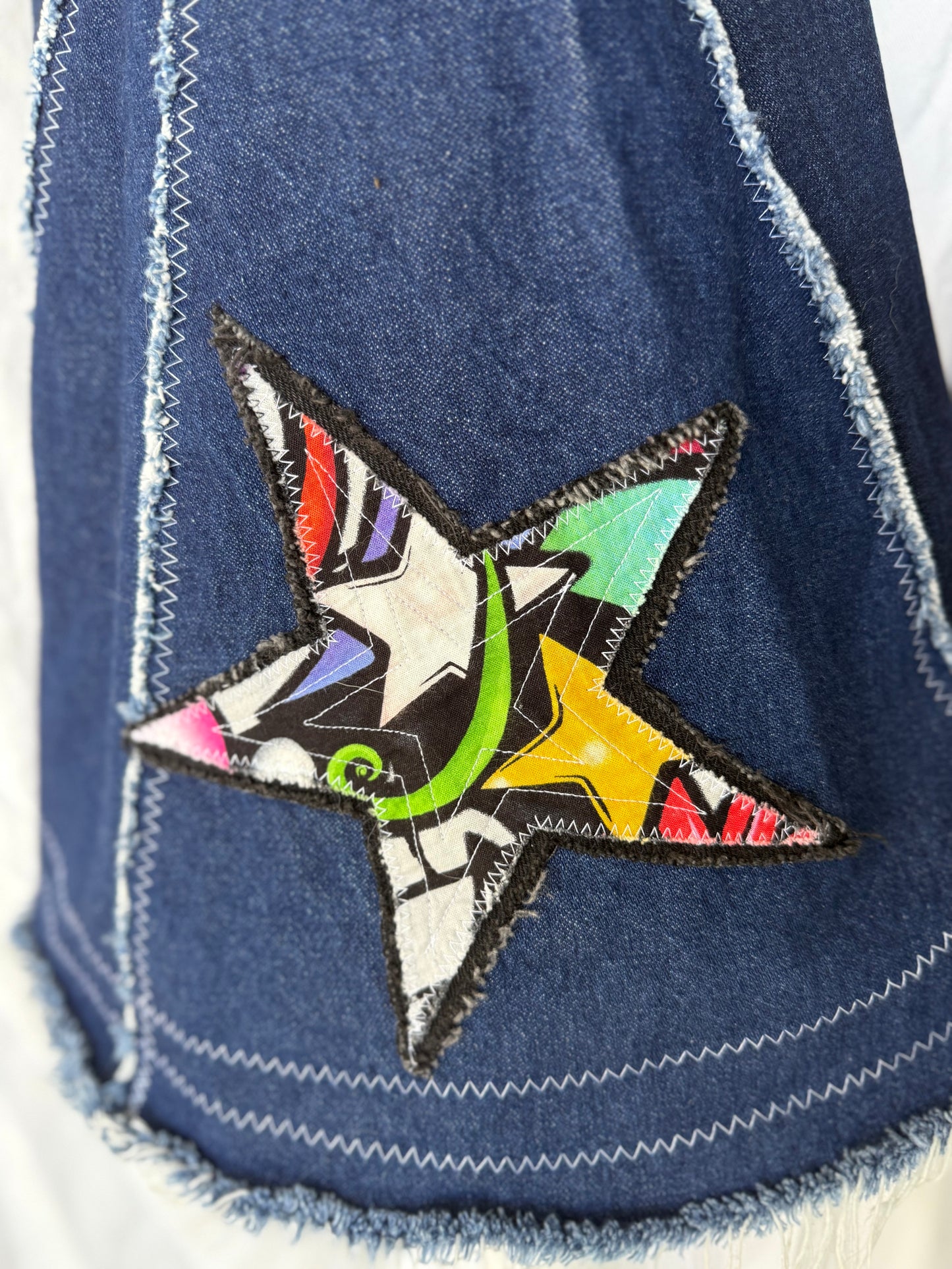 Sugar Skull Star Bell Bottoms – Upcycled Denim Statement Jeans (size 12)