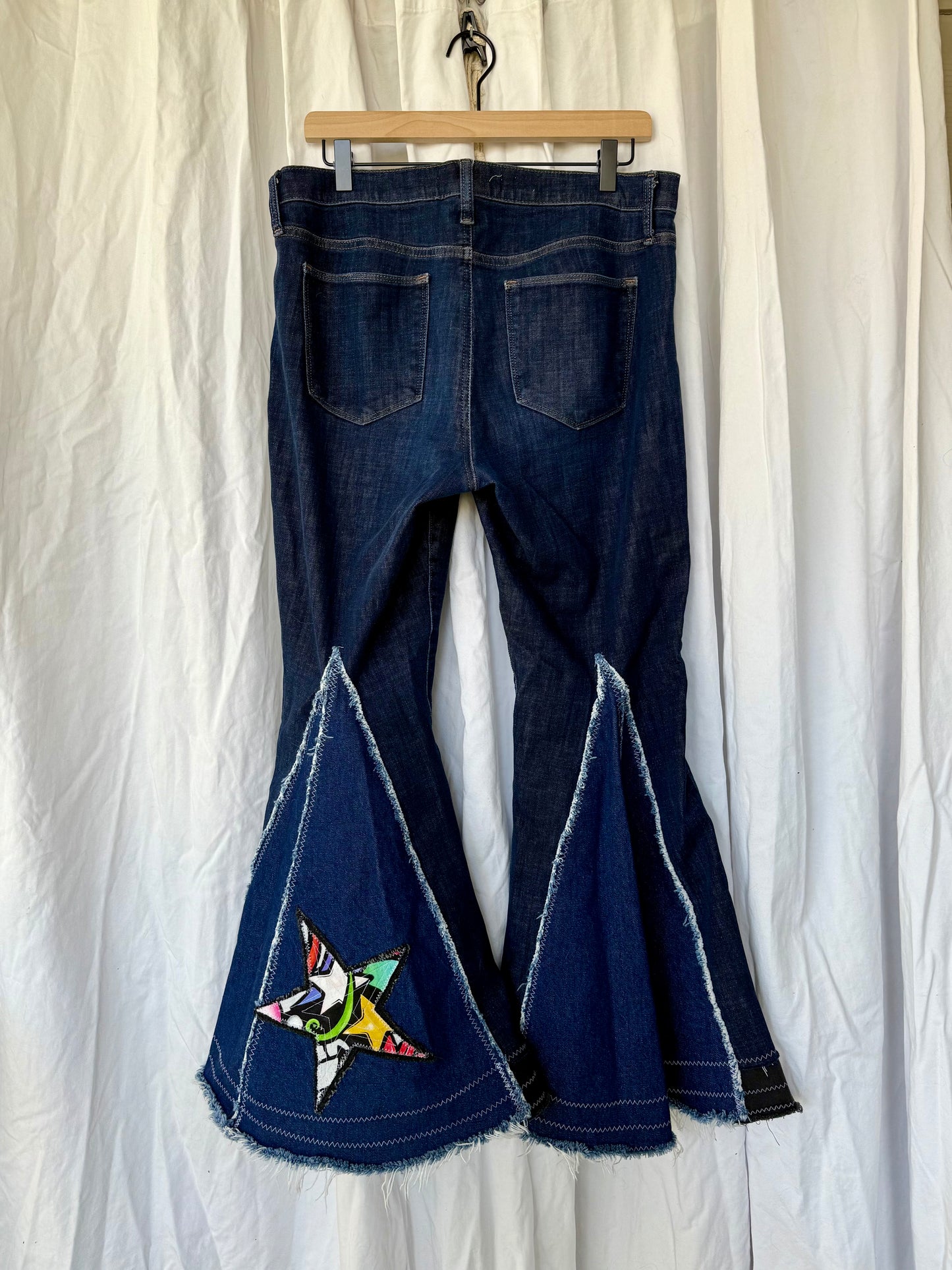 Sugar Skull Star Bell Bottoms – Upcycled Denim Statement Jeans (size 12)