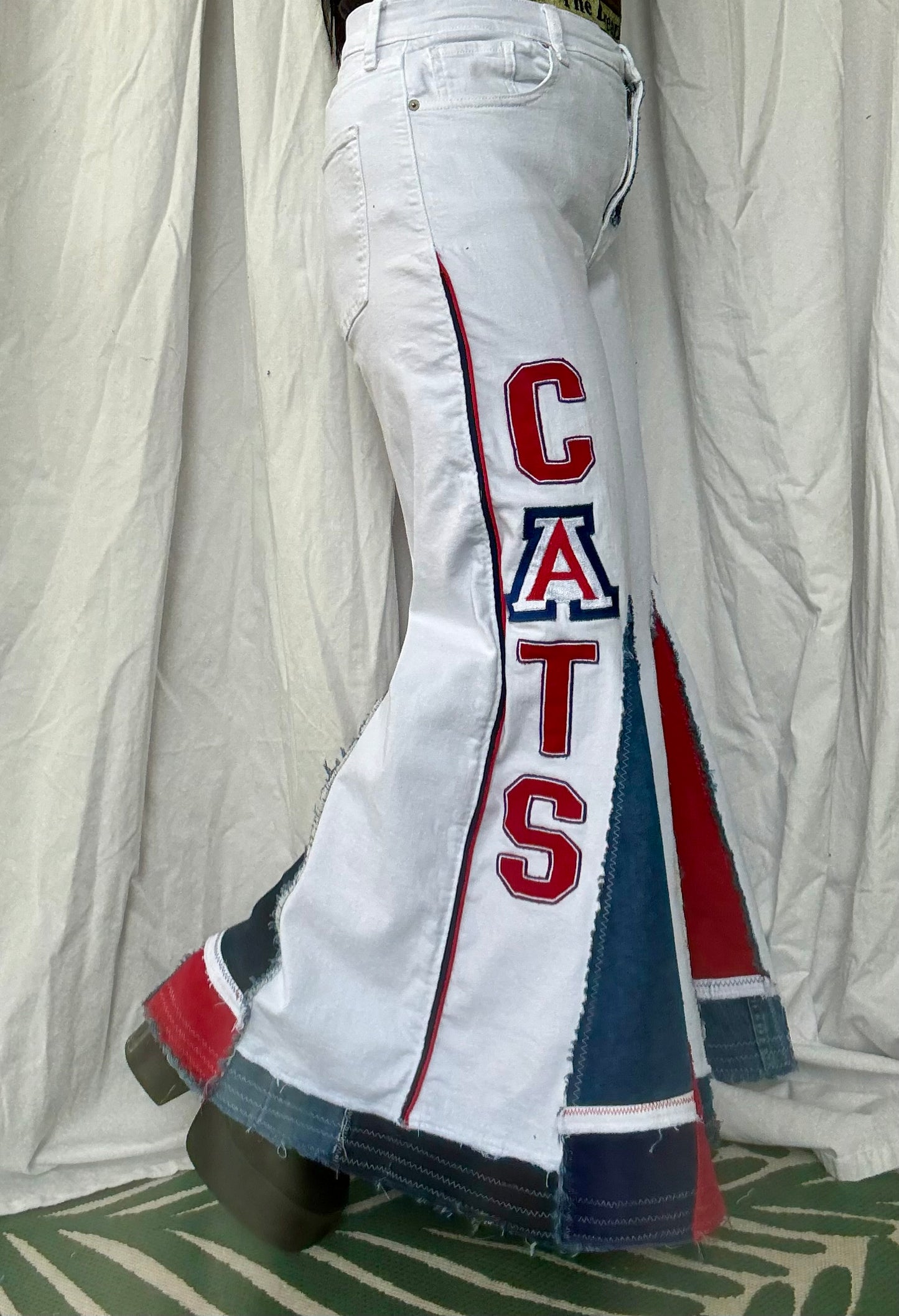 Upcycled “Wildcat Pride” Bell Bottom Jeans (size 16)