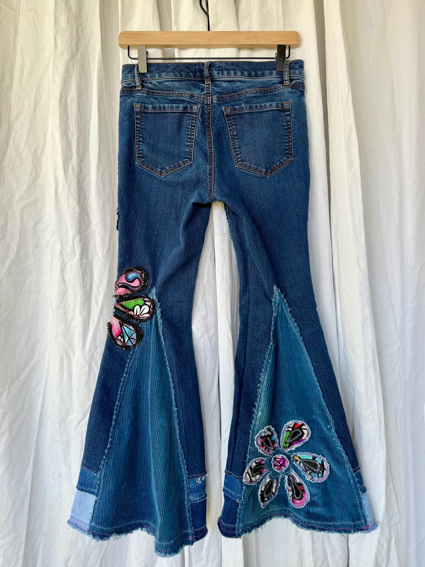 Upcycled Floral Skull Bell Bottom Jeans – Size 4