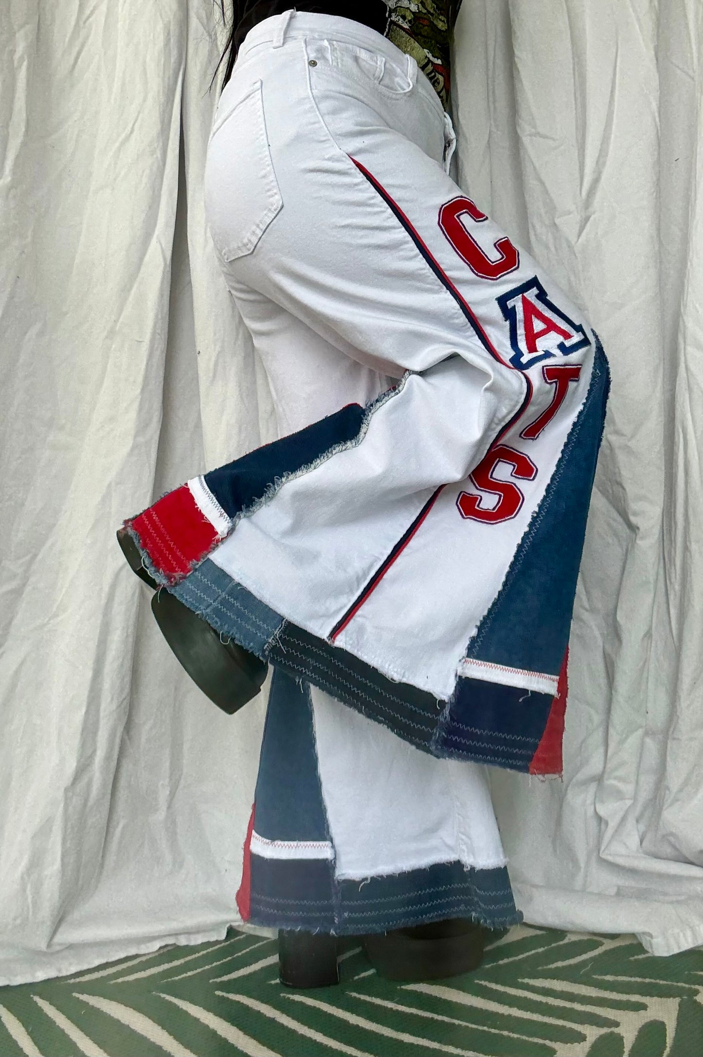 Upcycled “Wildcat Pride” Bell Bottom Jeans (size 16)